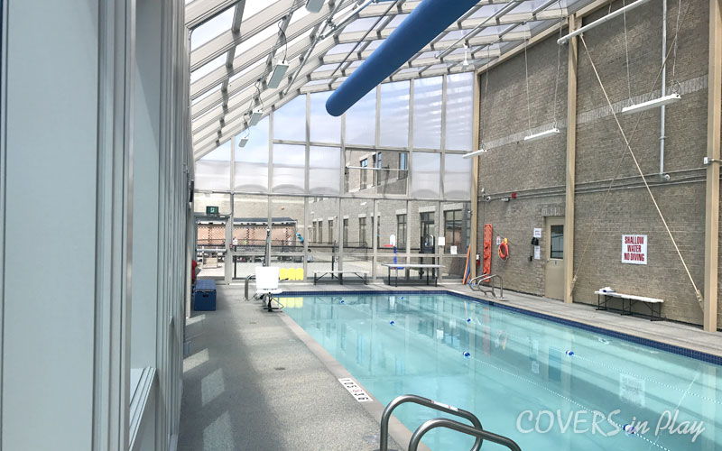 Interior of commercial pool enclosure in Mississauga, showing the seamless connection to the attached school.
