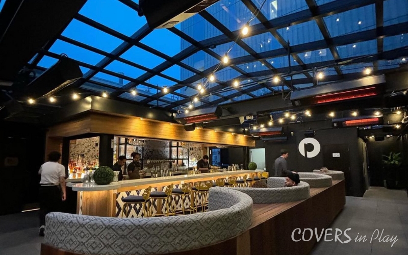 Interior view of restaurant roof enclosure at night in New York, NY