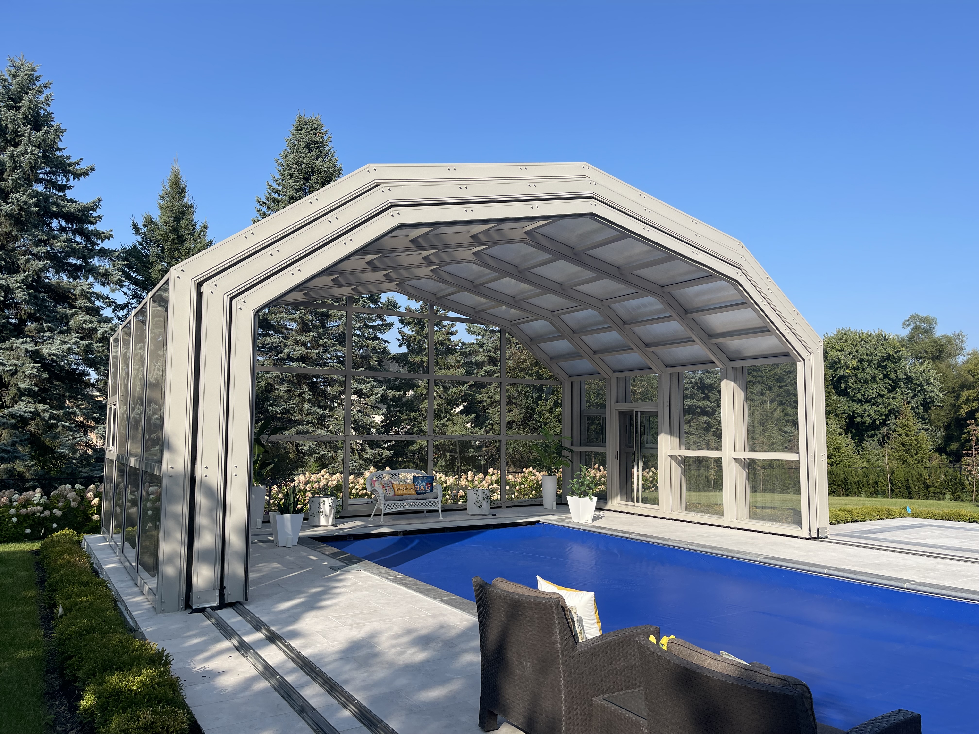 Angled view of a residential retractable roof in Ancaster