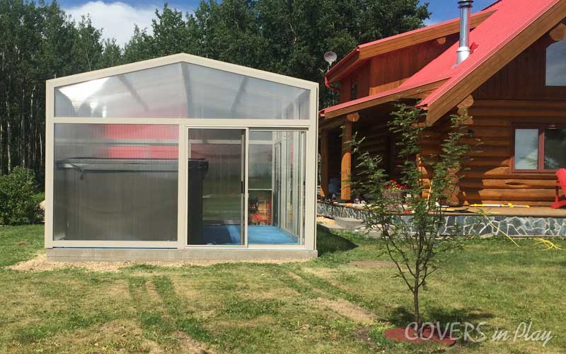 Exterior view of hot tub enclosure in Barrhead, showing the screen door entrance.