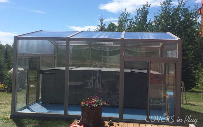 Side view of hot tub enclosure, showing the second sliding door entrance.
