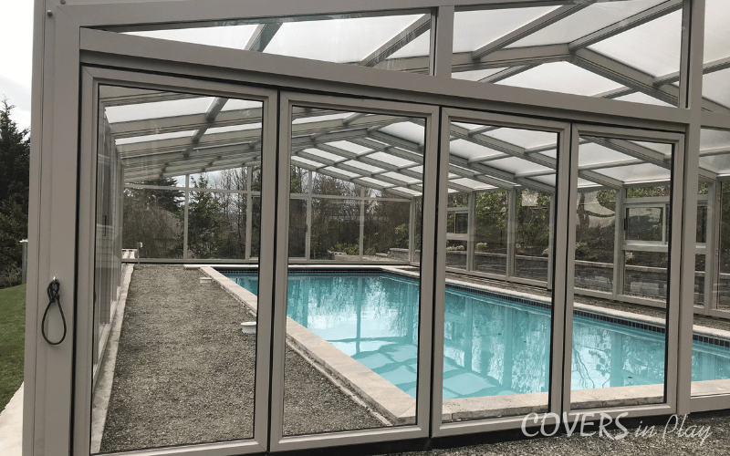 Exterior view of closed bifold doors of residential pool dome