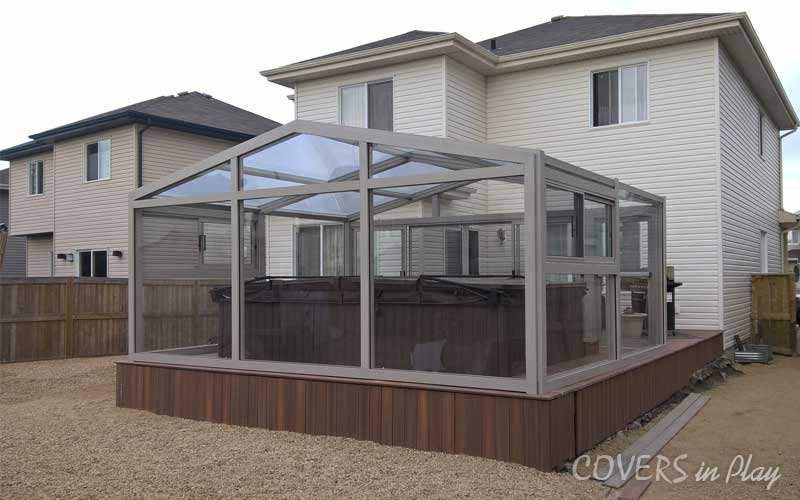 Rear exterior view of a fixed hot tub enclosure in Fort Saskatchewan