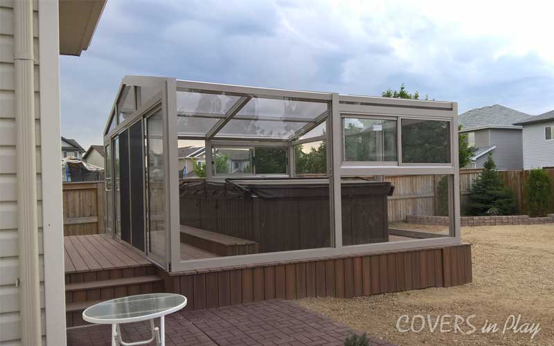 Side-angled exterior view of a fixed hot tub enclosure in Fort Saskatchewan