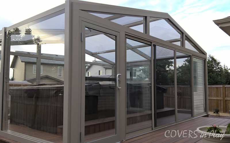 Front angled exterior view of fixed residential swim spa enclosure in Fort Saskatchewan