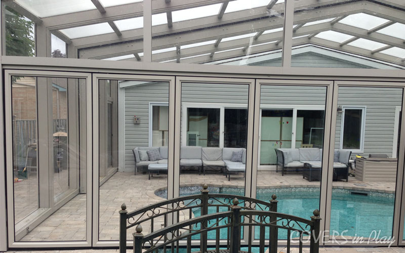 Close-up view of closed bi-fold doors in Holland Landing enclosure