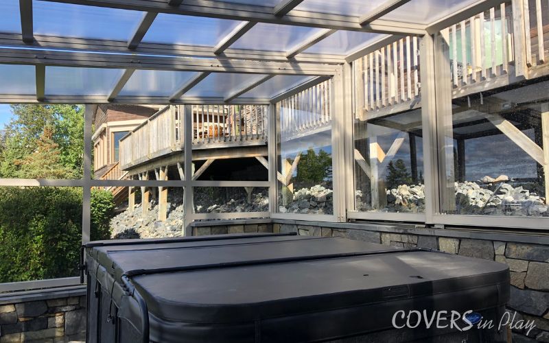 Interior angled view of retractable hot tub enclosure in Kenora, ON