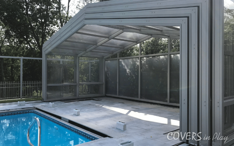 An exterior close-up of an opened pool dome in Lakewood