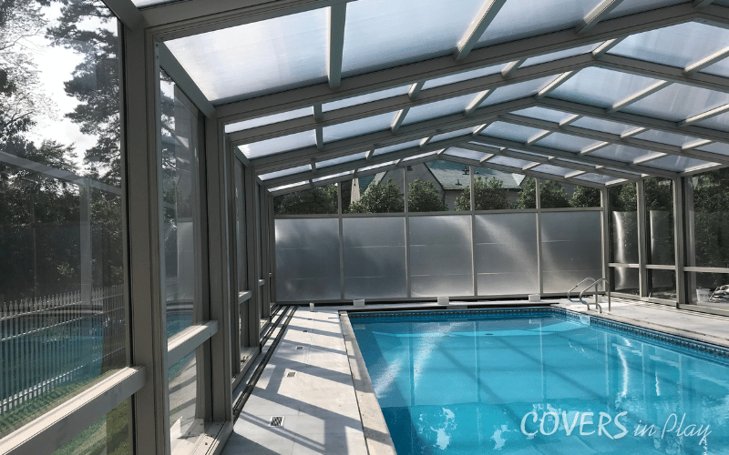Front interior view of closed residential pool enclosure in Lakewood