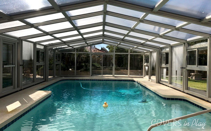 Front interior view of closed pool enclosure dome door in Mesa residential home