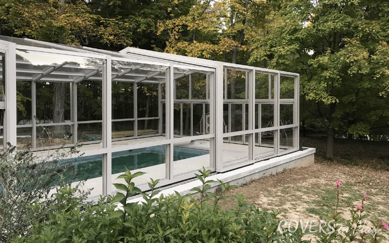 Side alternative exterior view of residential swimming pool enclosure in Paris