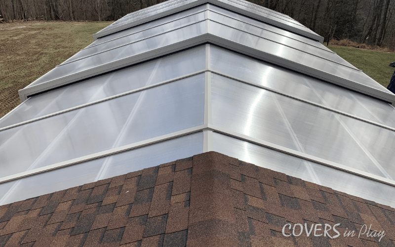 Exterior above view of closed pool enclosure