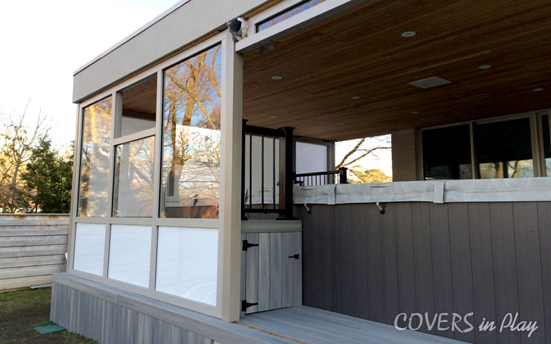 Exterior close up of swim spa enclosure with bifold doors open, showing the flexibility of the structure.