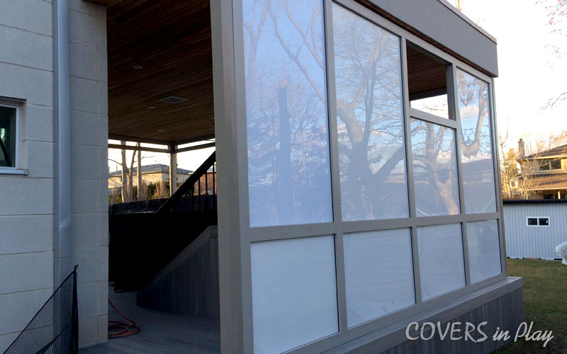 Rear exterior view of swim spa enclosure in Port Credit, showing the frosted acrylic walls for privacy.