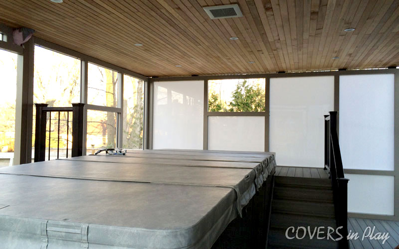 Interior of swim spa enclosure showing the wooden interior with privacy from the frosted acrylic walls.