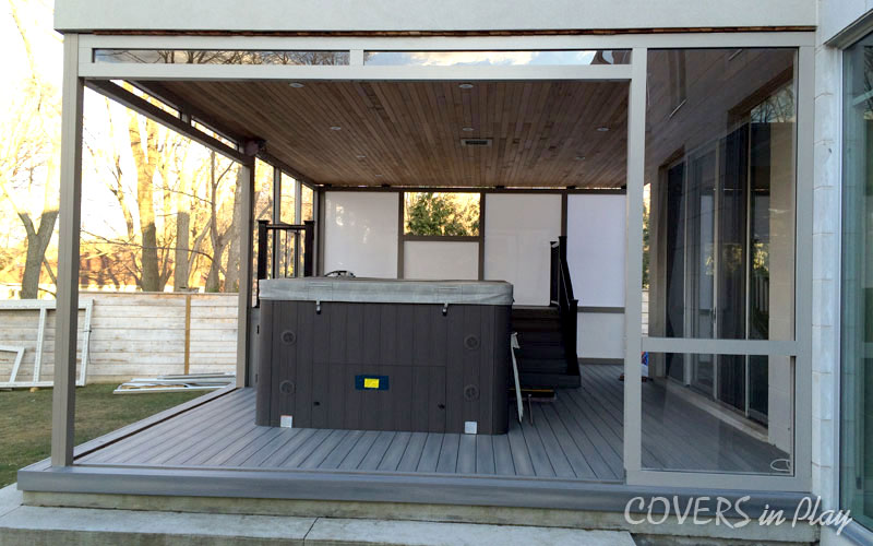 Side view of swim spa enclosure with bi-fold doors open and removed