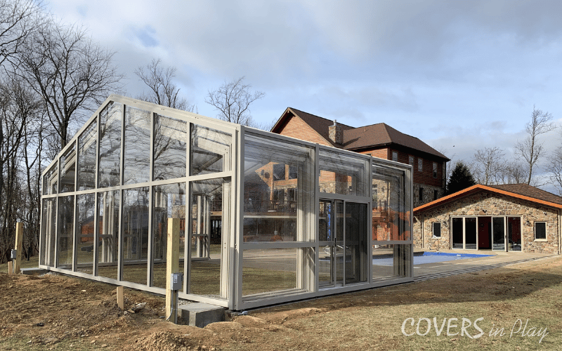 Exterior angled view of opened pool enclosure