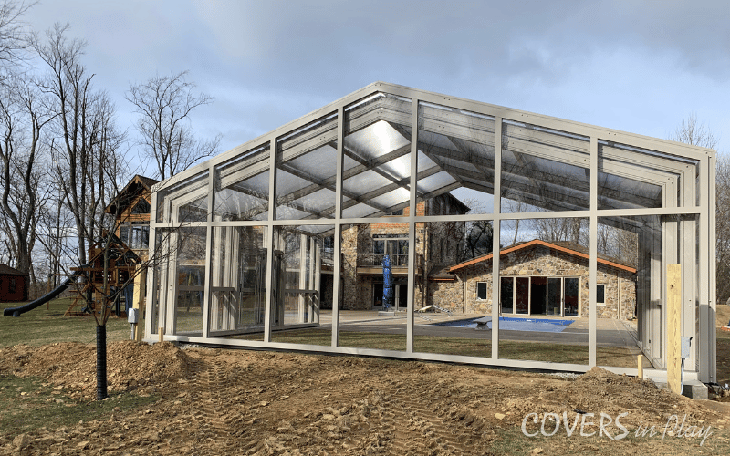 Exterior rear view of opened pool enclosure