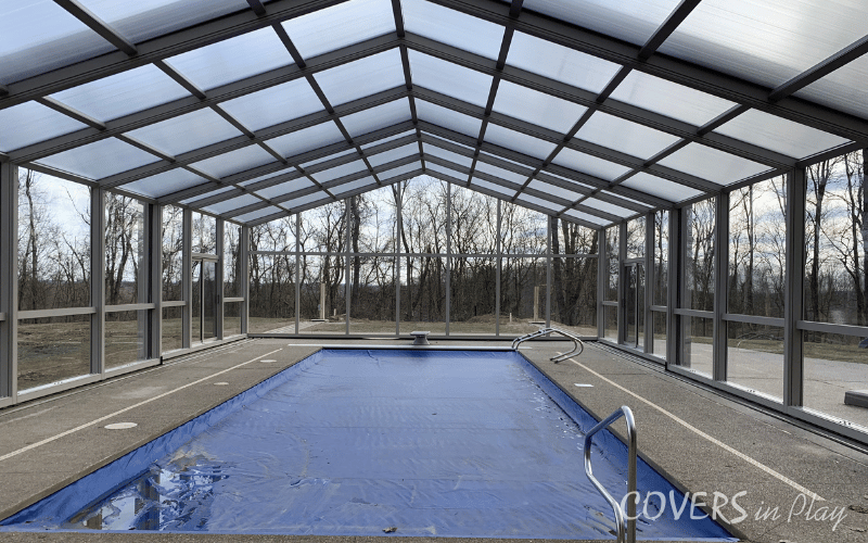 Interior view of large backyard pool enclosure in Triadelphia, WV