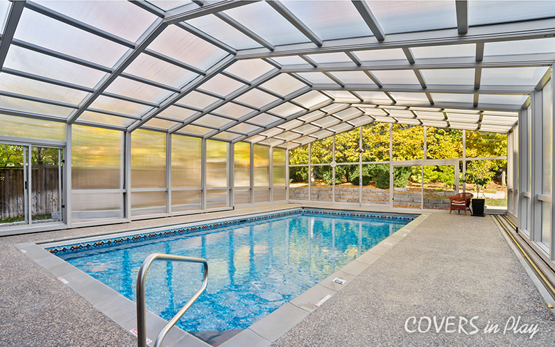Alternative side angle of closed pool enclosure with frosted windows in Whitby