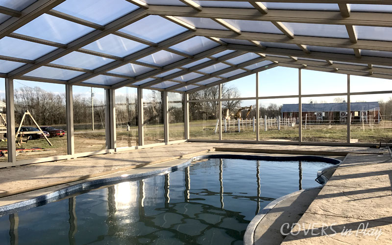 Inside angled view of a closed pool enclosure in Clayton