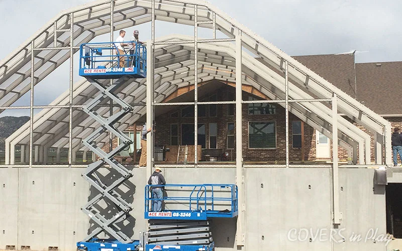 Exterior rear view of the construction of swimming pool dome in Nephi, UT